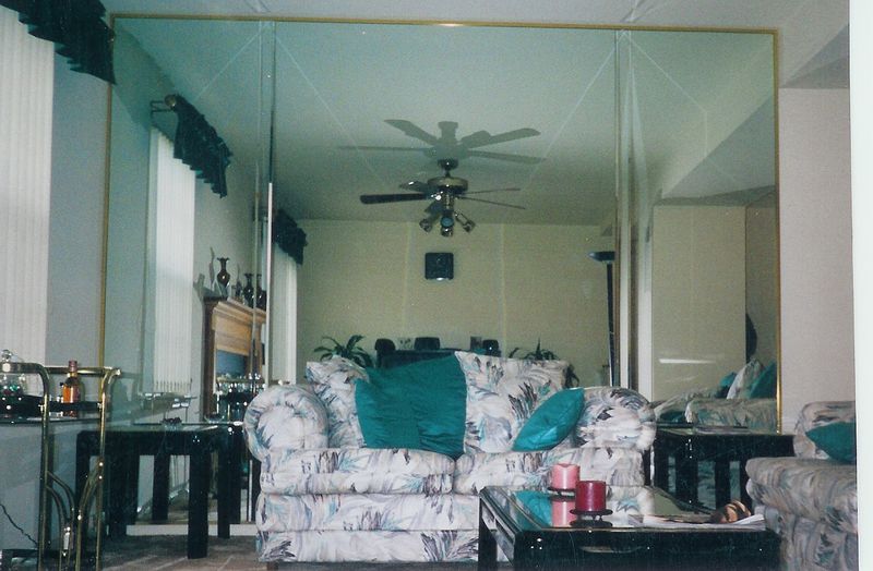 Wall-to-Wall Mirrored Panels: The Funhouse Effect