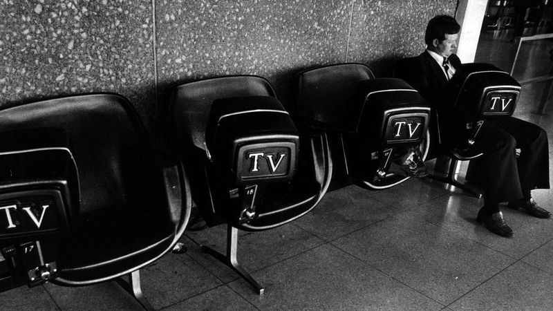 Wall-Mounted TV Playing Soap Operas