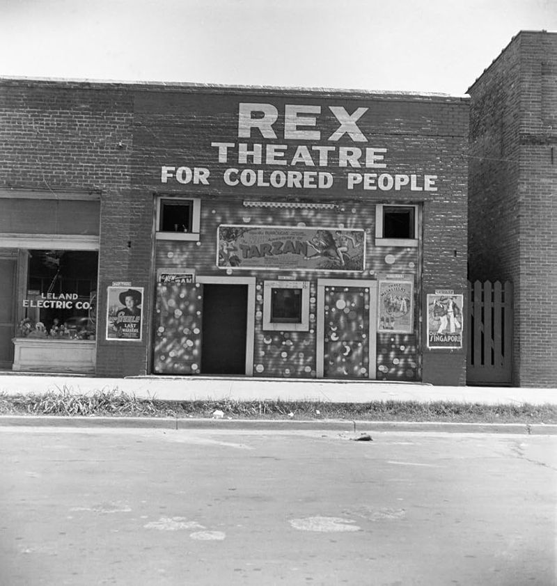 Rex Theatre for Colored People in Leland, 1937, by Dorothea Lange